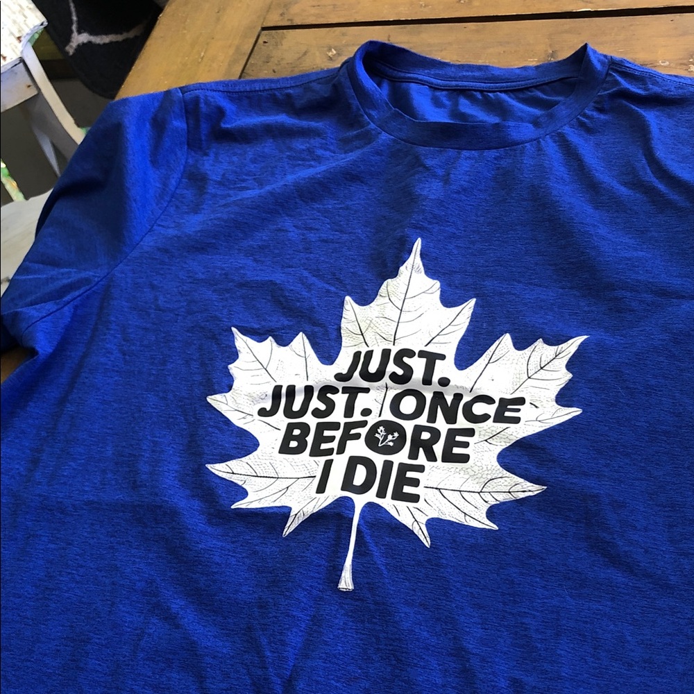 Blue Graphic Tee with White Maple Leaf Slogan